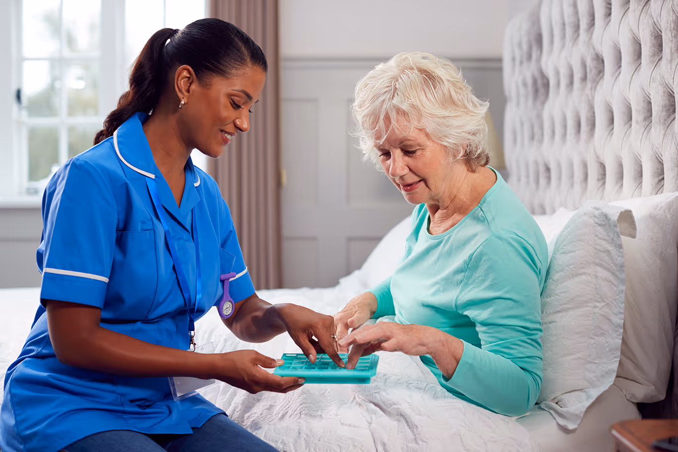 Elderly lady with nurse