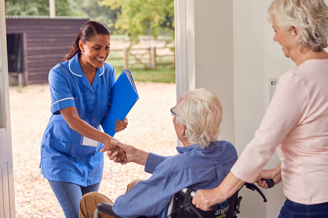 Elderly lady with nurse