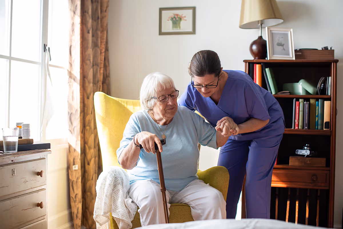 Elderly lady with nurse