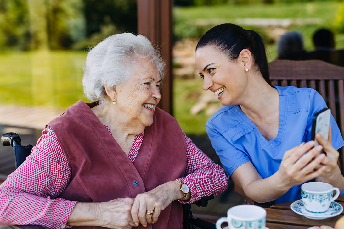 Elderly lady with nurse