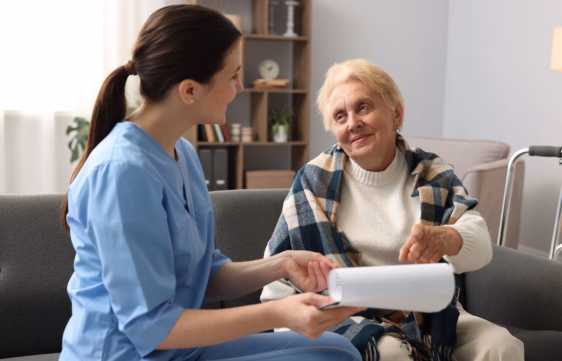 Elderly lady with nurse