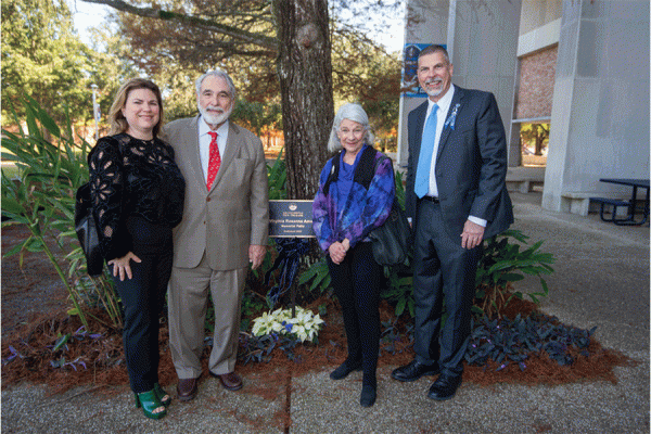 Lissy Amato, John Amato, Virginia Amato and UNO President John Nicklow at the dedication ceremony for the Virginia Rosanne Amato Memorial Patio on the campus of the University of New Orleans.