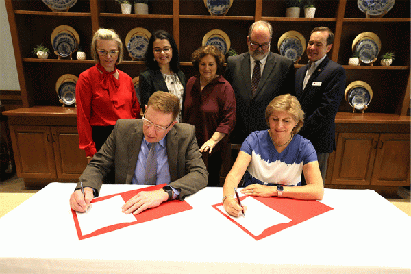 UNO President Kathy Johnson and Nicholls State University President Jay Clune sign an agreement that will expand pathways to a mechanical engineering degree in South Louisiana.