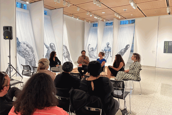 University of New Orleans history professor Andrea Mosterman and other panelists discuss the art exhibit, “The Price of Half-Freedom.”