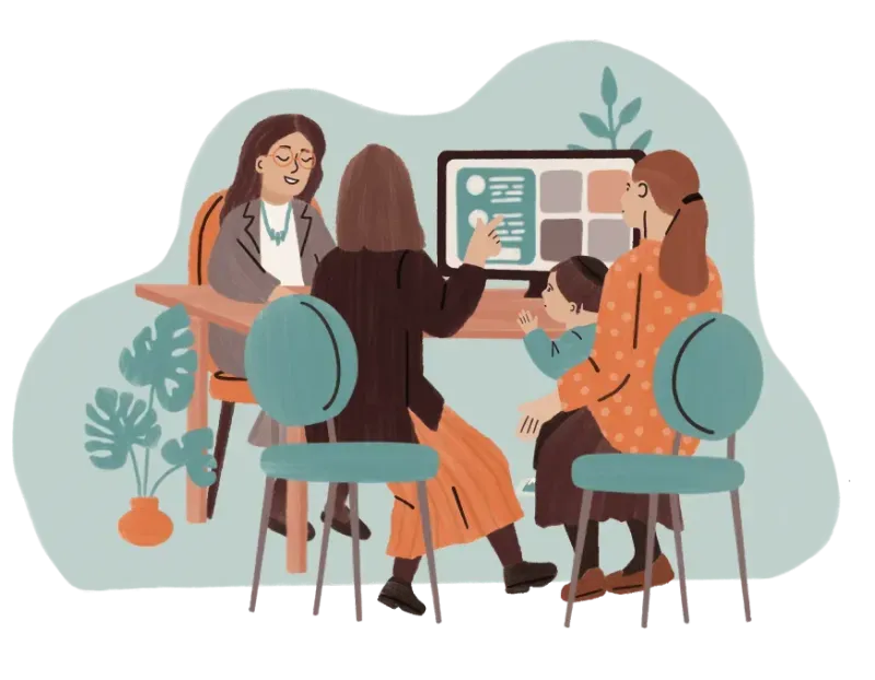 Three women and a child seated around a computer, discussing content on the screen in an office.