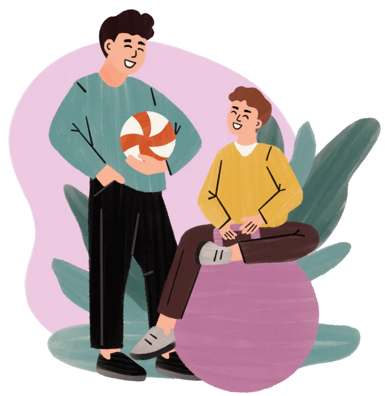 Two smiling boys, one standing holding a ball, the other sitting on a large purple exercise ball.