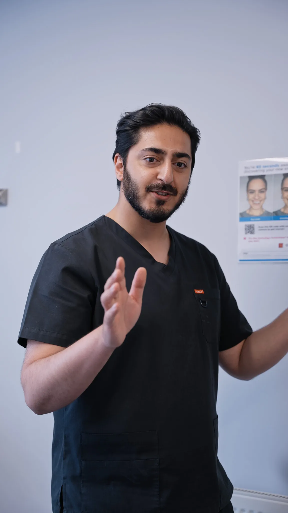 Dr Hamza Mirza in consultation at Sale Dental Spa