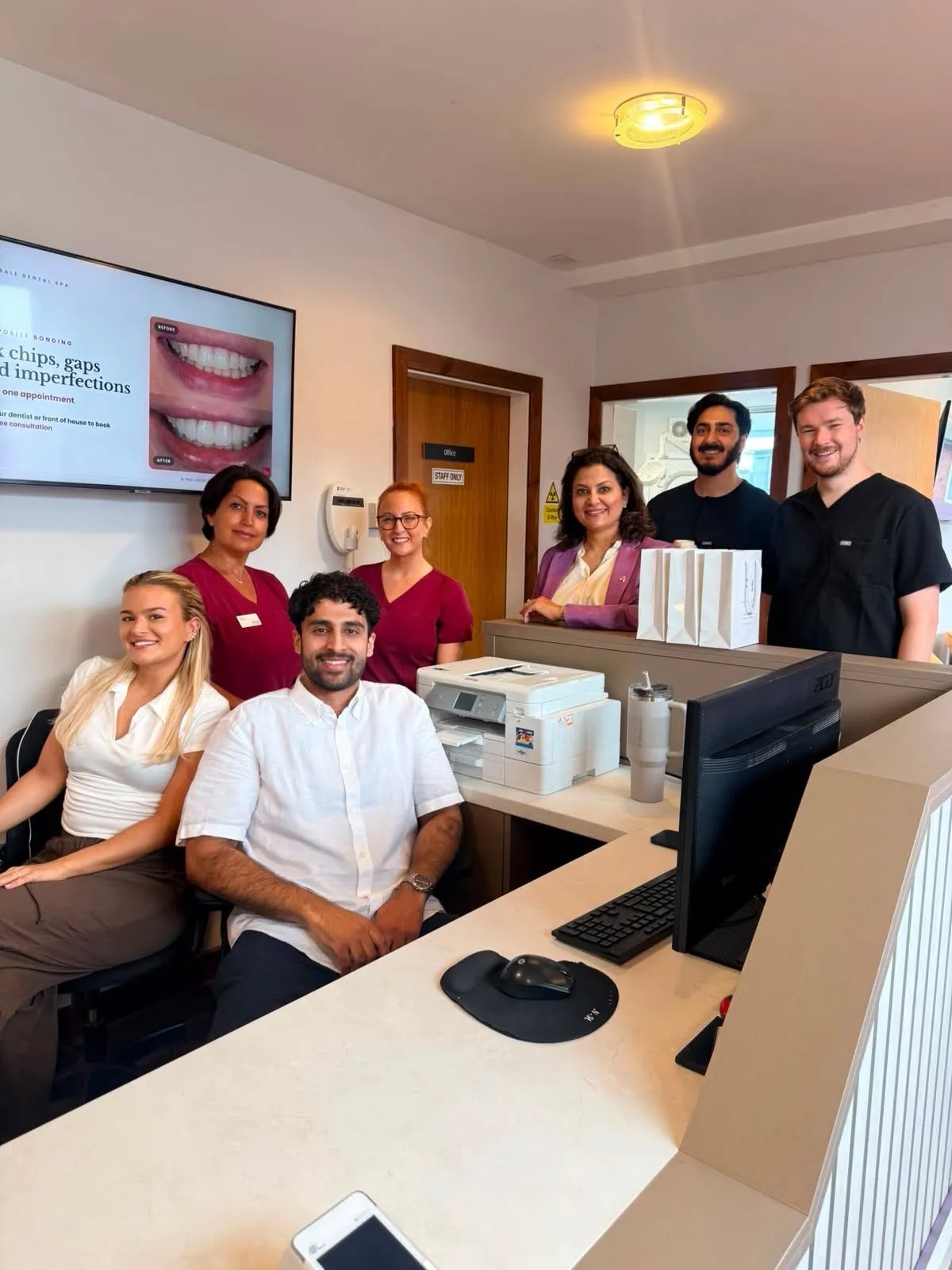 The Sale Dental Spa team together at reception