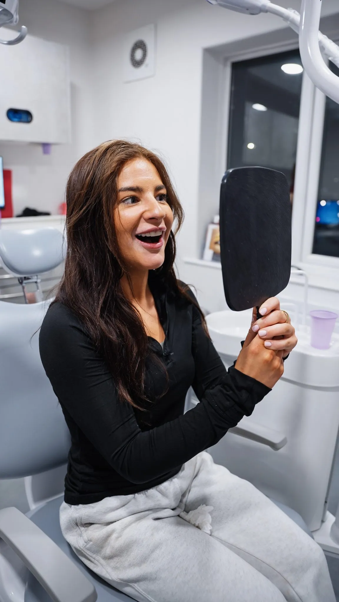 A patient's new smile after treatment at Sale Dental Spa