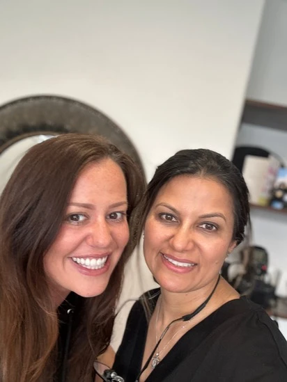 Dr Aisha Ahmed with a patient at Sale Dental Spa