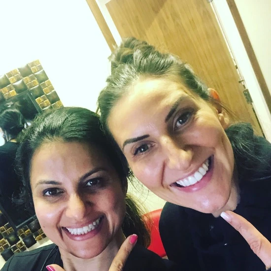 Dr Aisha Ahmed with a patient at Sale Dental Spa