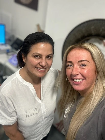 Dr Aisha Ahmed with a patient at Sale Dental Spa