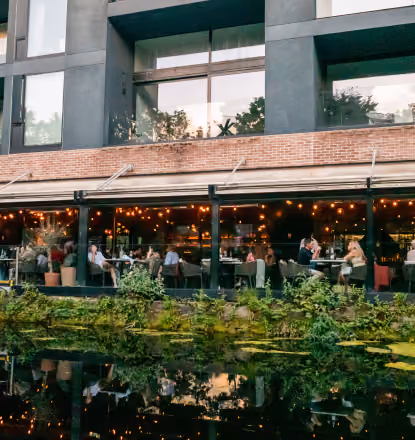 Angelina's canal-side terrace lit up in the evening, Dublin 4