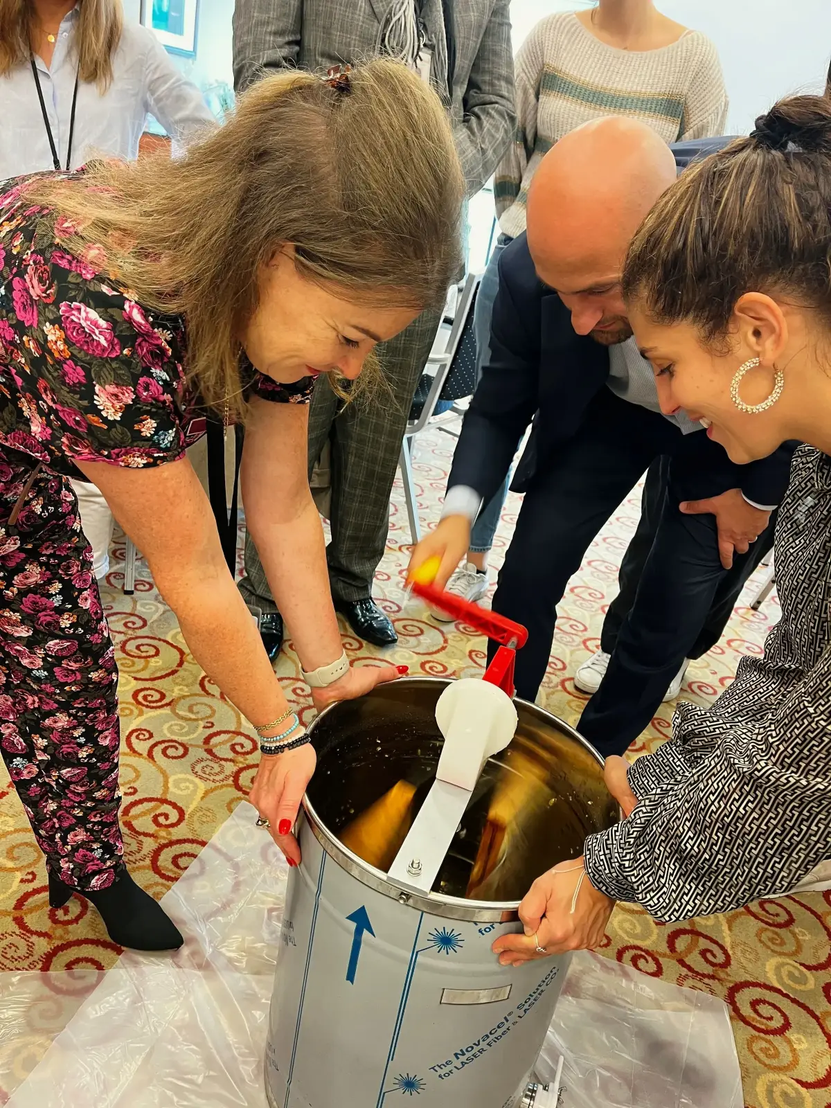 Tenants extracting honey at an Alvéole workshop