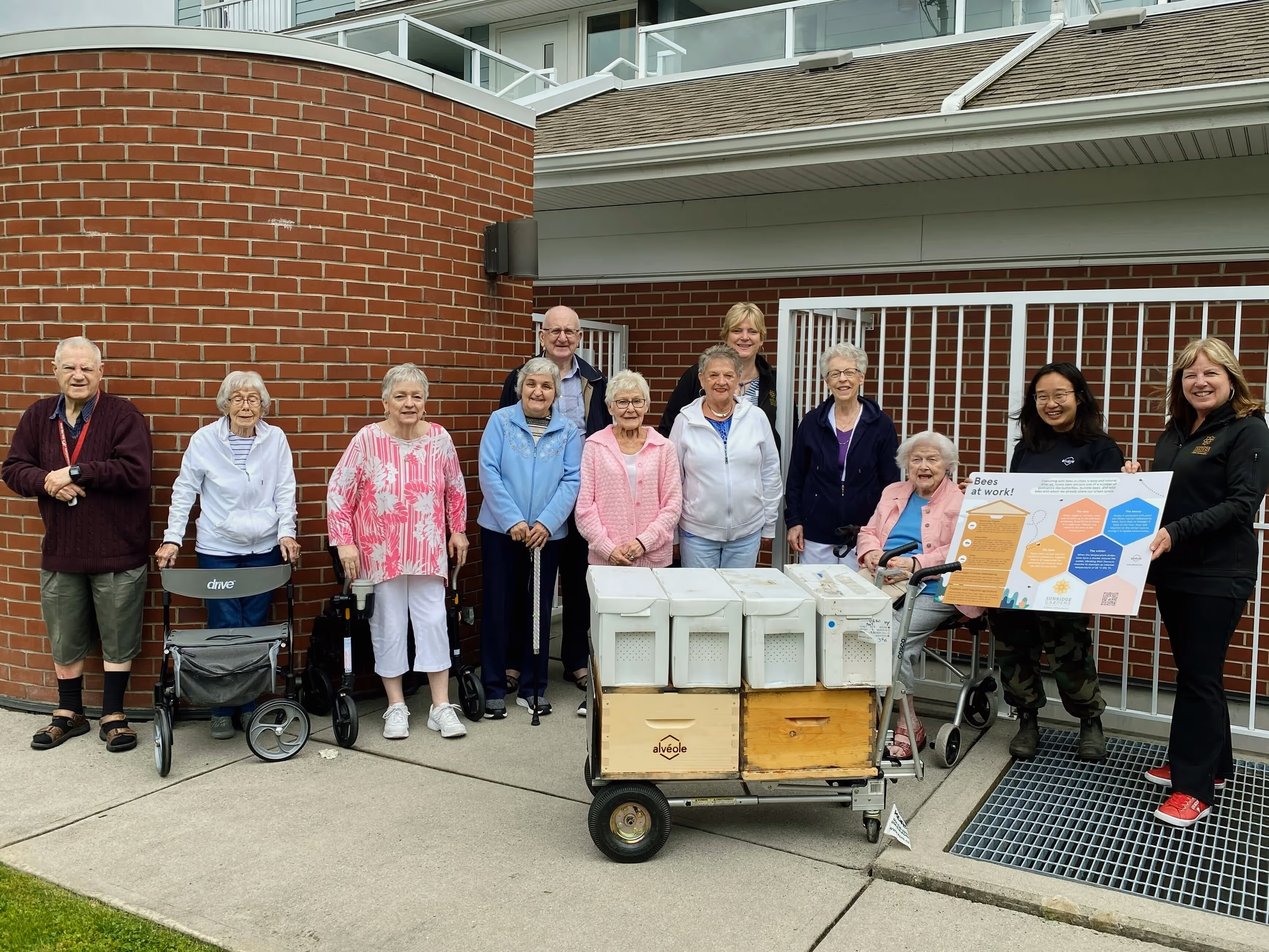 Group of seniors at an Alvéole rooftop program event