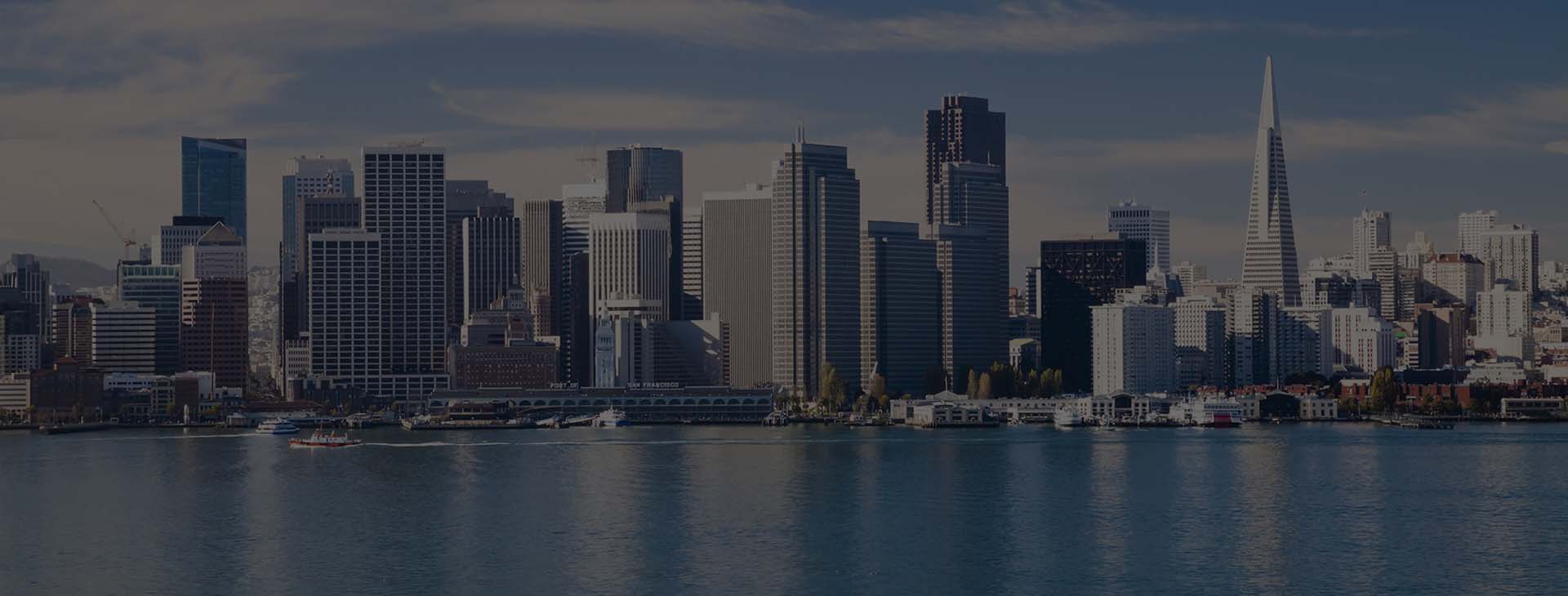 San Francisco financial district skyline seen from the bay, with the Transamerica Pyramid visible