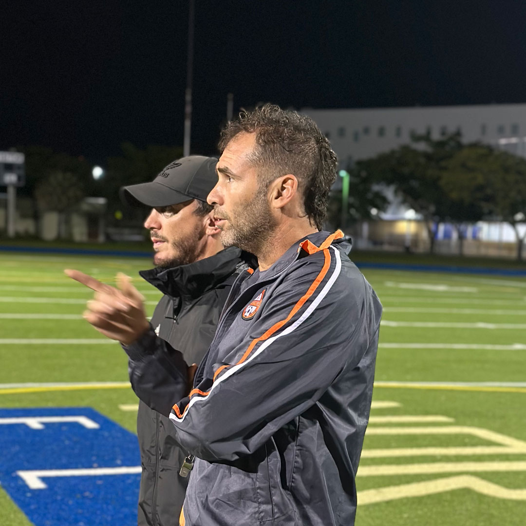 Jorge Cuina coaching players during a Soccer Paradise FC training session.