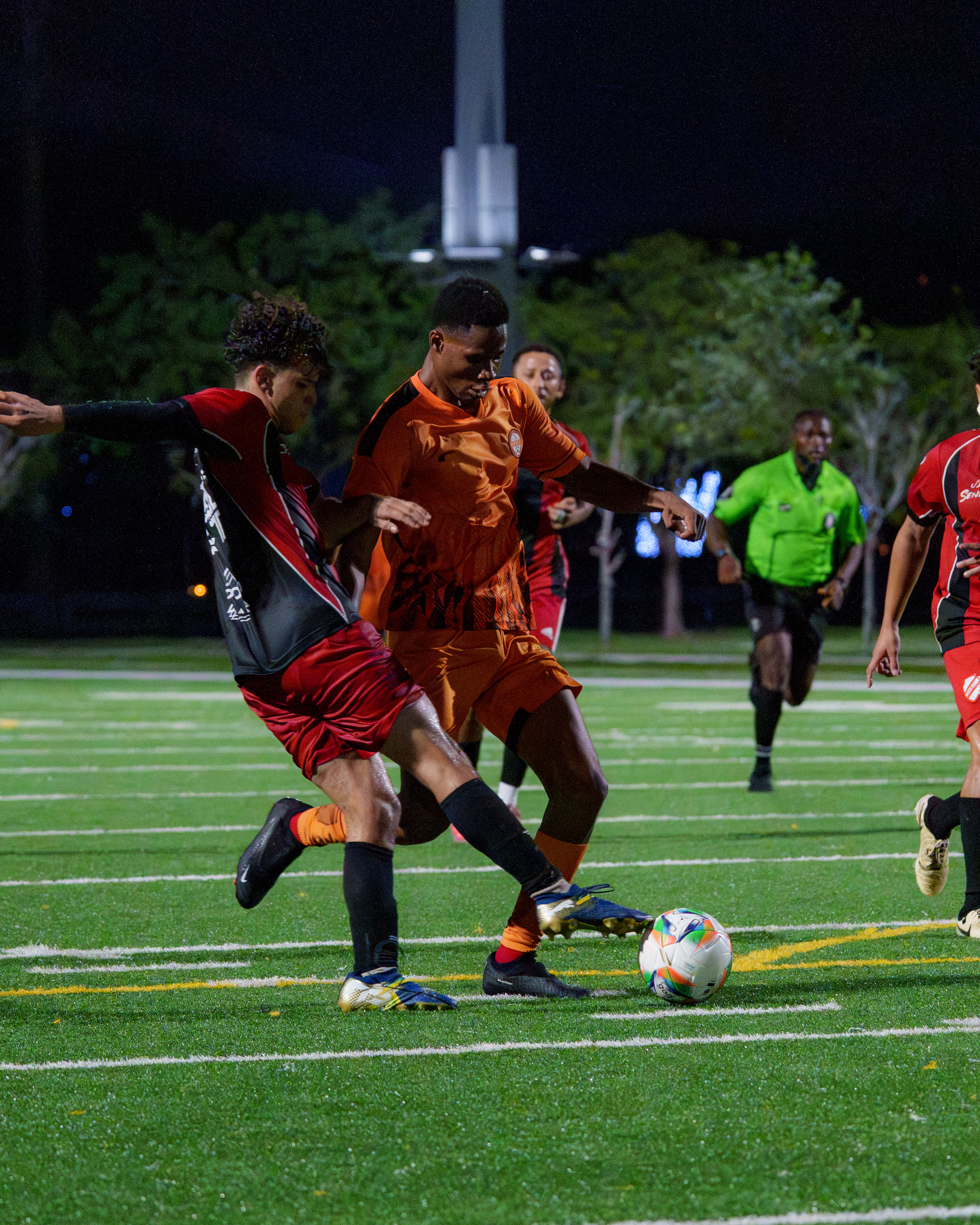 Youth team playing a competitive soccer game.