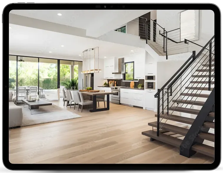 Nowoczesny jasny salon z otwartą kuchnią i schodami z metalową balustradą.