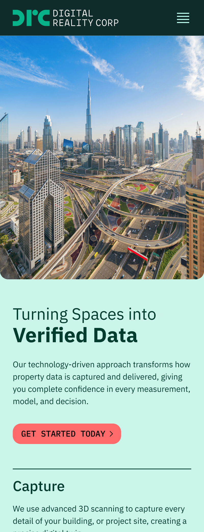 Aerial view of a highway interchange and Dubai city skyline with Burj Khalifa under a blue sky. Snippet from the Digital Reality Corp website.
