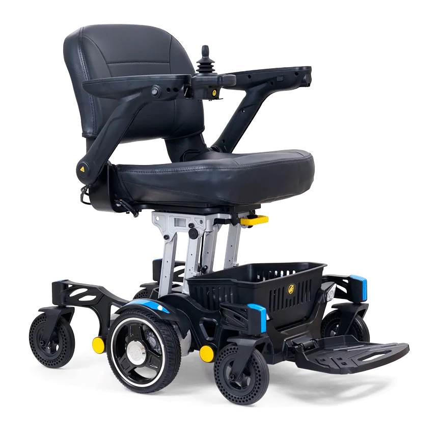 Simple Comforts motorized stair lift seat with black leather padding, adjustable armrests, a built-in joystick controller, and a secure yellow safety lever, designed for home accessibility and mobility comfort.