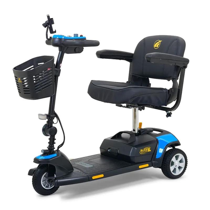 Golden Buzzaround XL three-wheel mobility scooter with a padded seat and front basket.