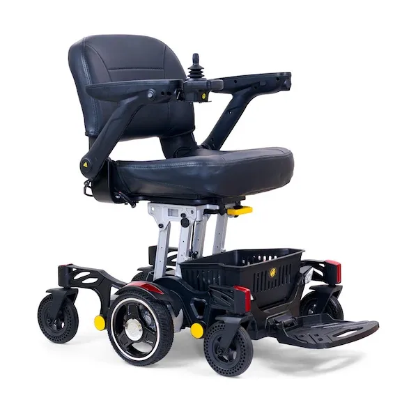 Golden Buzzaround CarryOn power wheelchair with a black padded seat, joystick control, and rear basket.