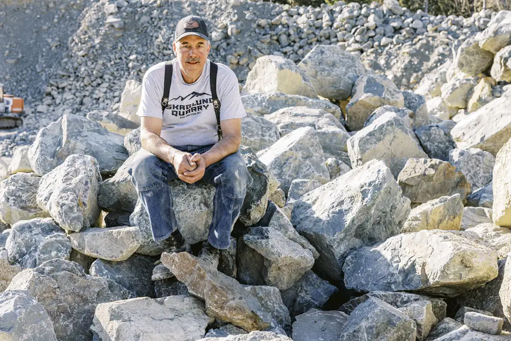 One man rocks with person in photo for rock size reference | Skaglund Quarry | Arlington, WA