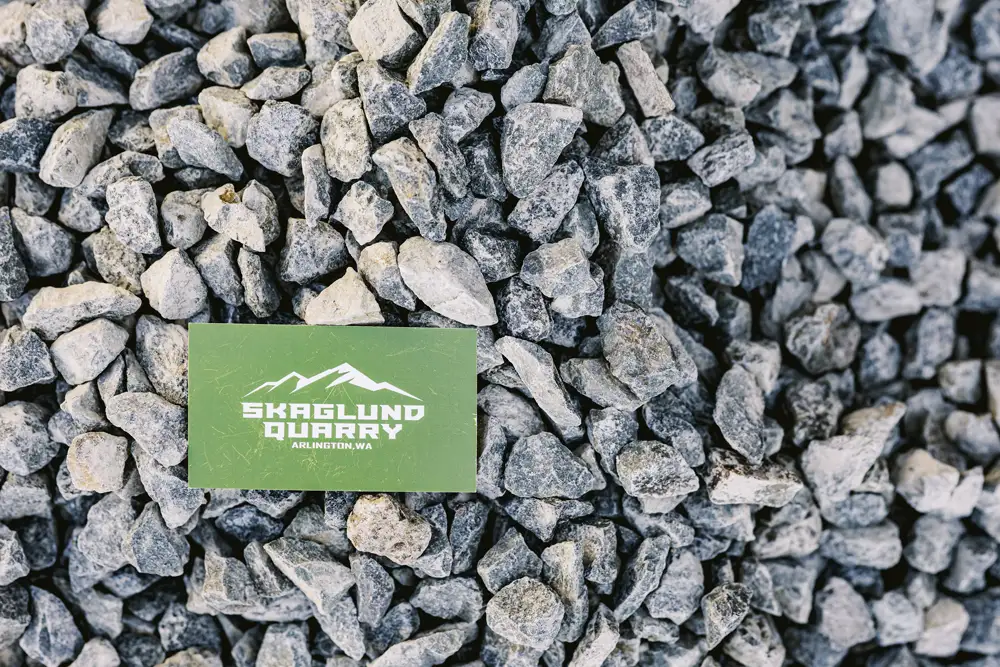 3/4" chip gravel with business card for size reference | Skaglund Quarry | Arlington, WA