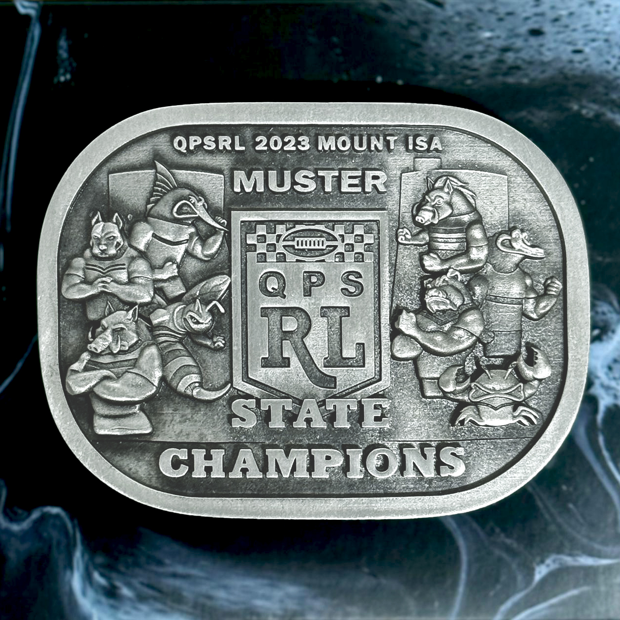 Custom pewter sports team championship belt buckle produced for the QPSRL State Champions event by Buckingham Pewter, Western Australia.