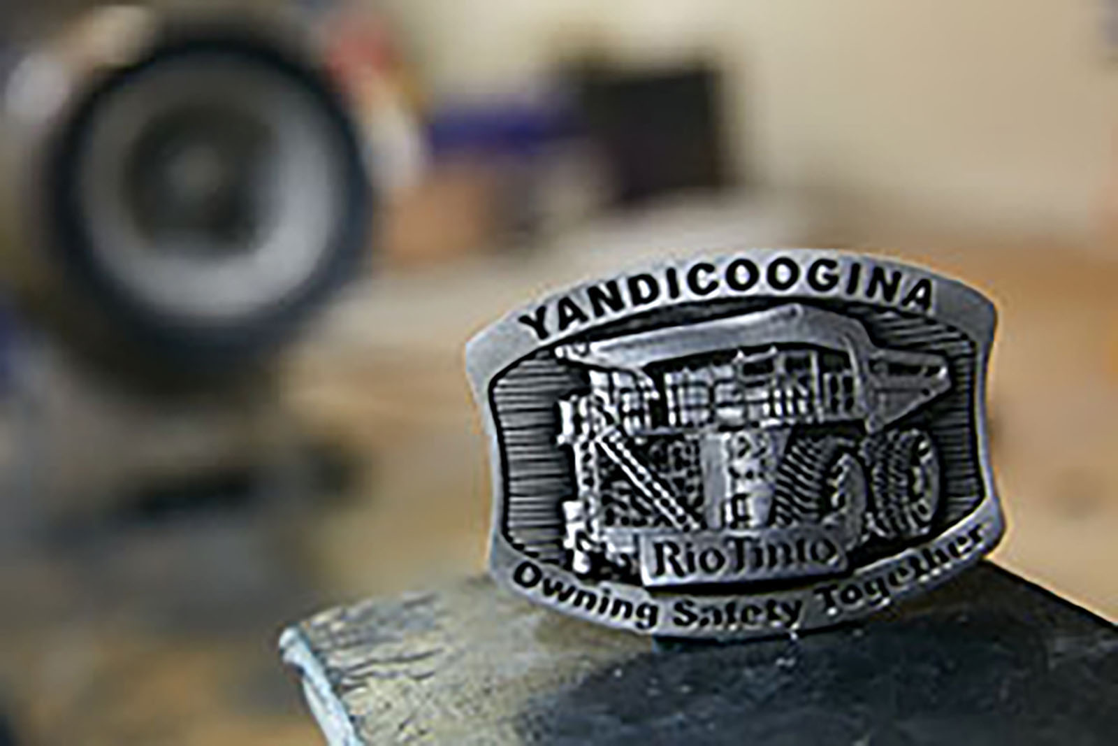 Yandicoogina Rio Tinto commemorative mining belt buckle featuring mining haul truck artwork