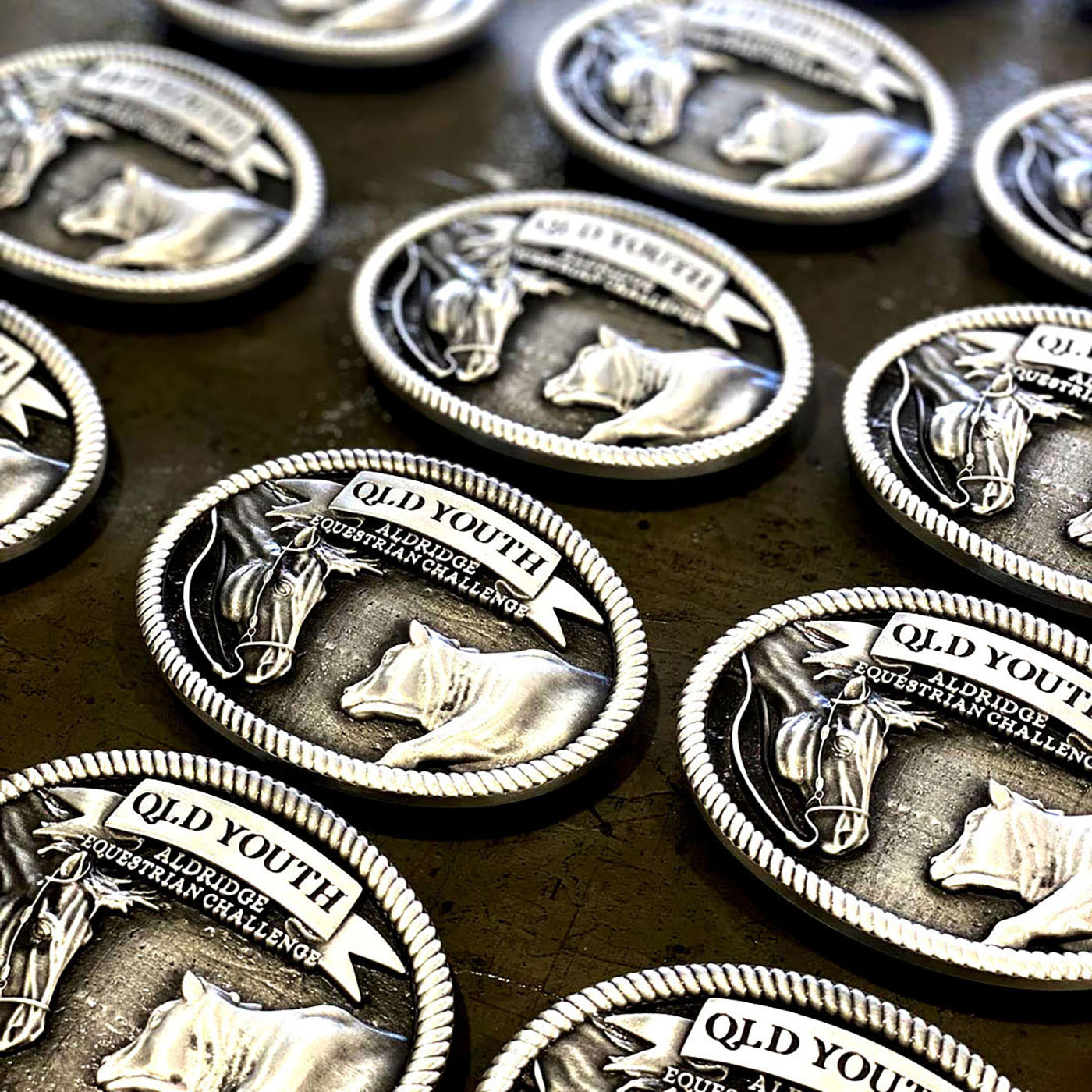 Queensland Youth rodeo champion belt buckles produced in custom pewter