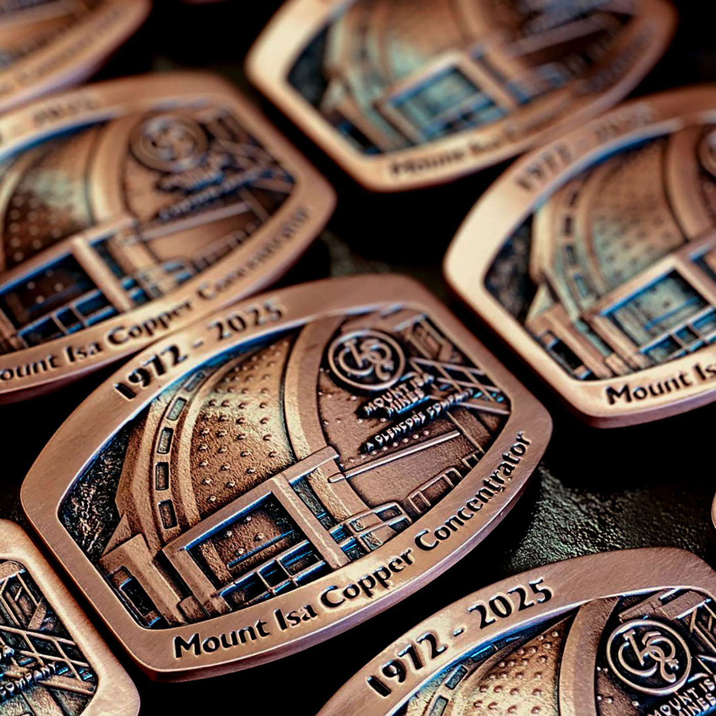 Mount Isa Copper Operations commemorative belt buckles in antique copper finish