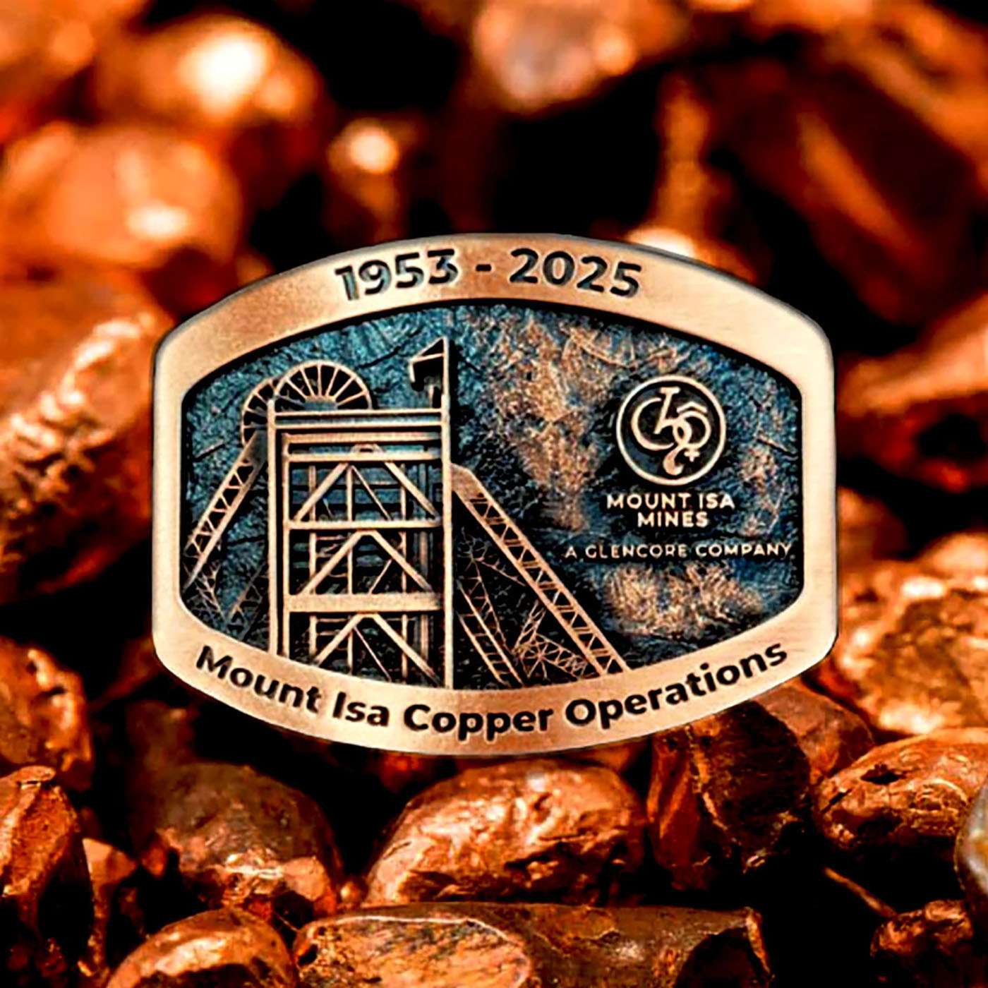 Mount Isa Copper Operations commemorative belt buckle with mining headframe artwork