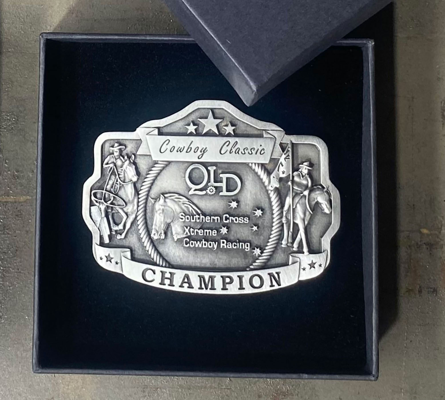 Southern Cross rodeo champion belt buckle presented in premium display box
