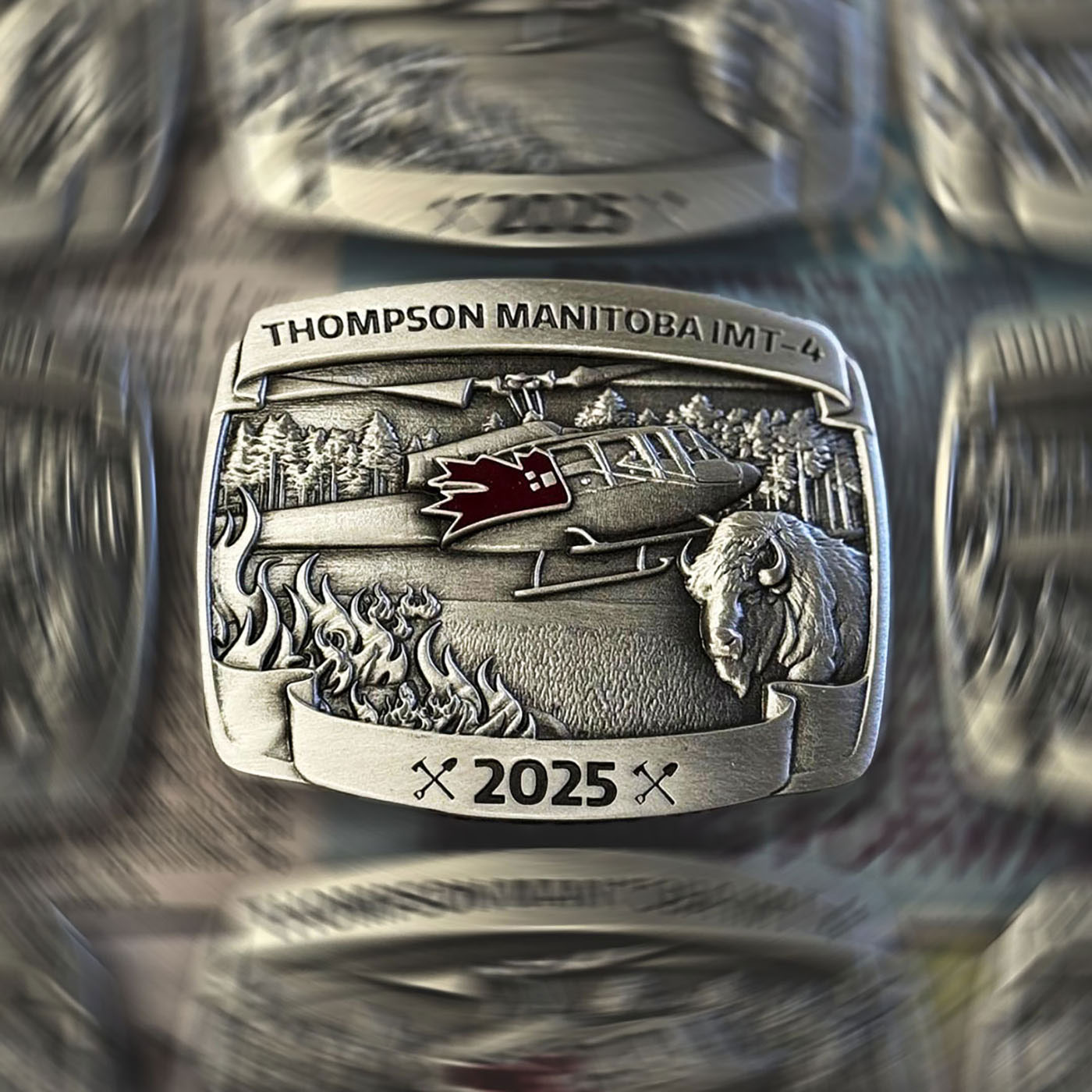 Thompson Manitoba IMT-4 custom commemorative belt buckle featuring helicopter wildfire response artwork
