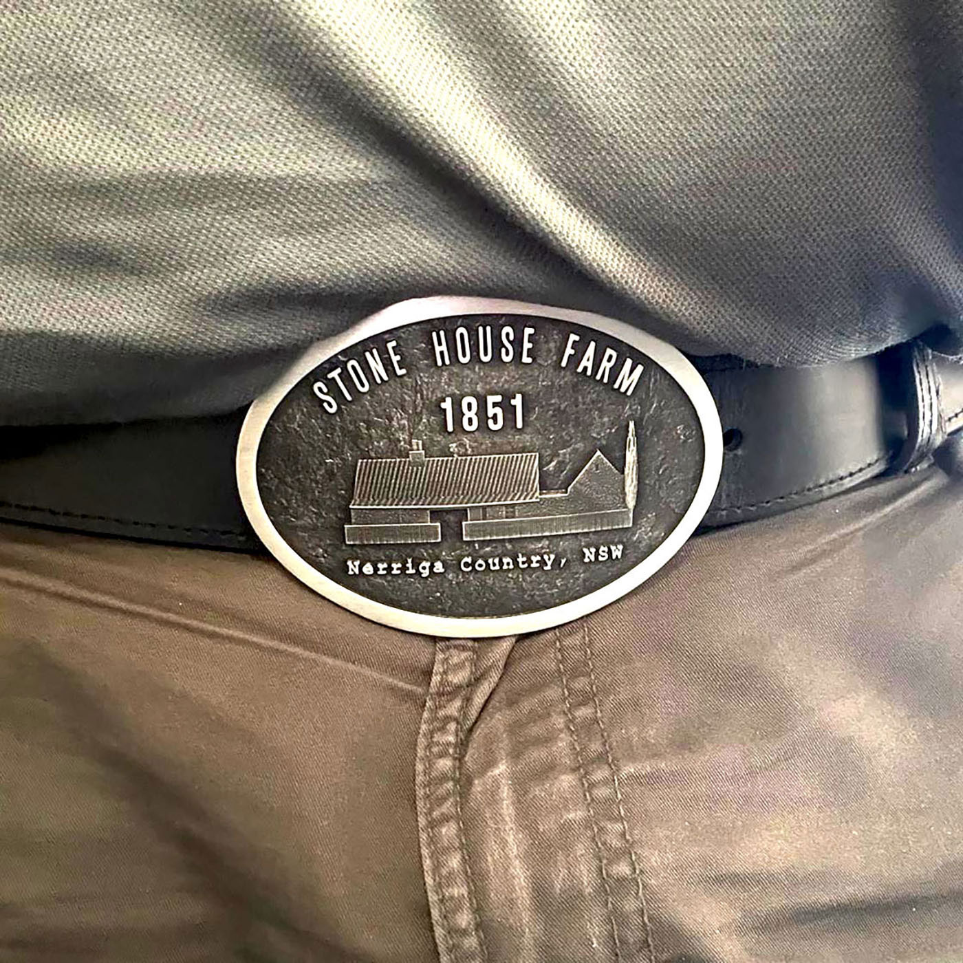 Stone House Farm custom heritage style belt buckle worn with everyday workwear