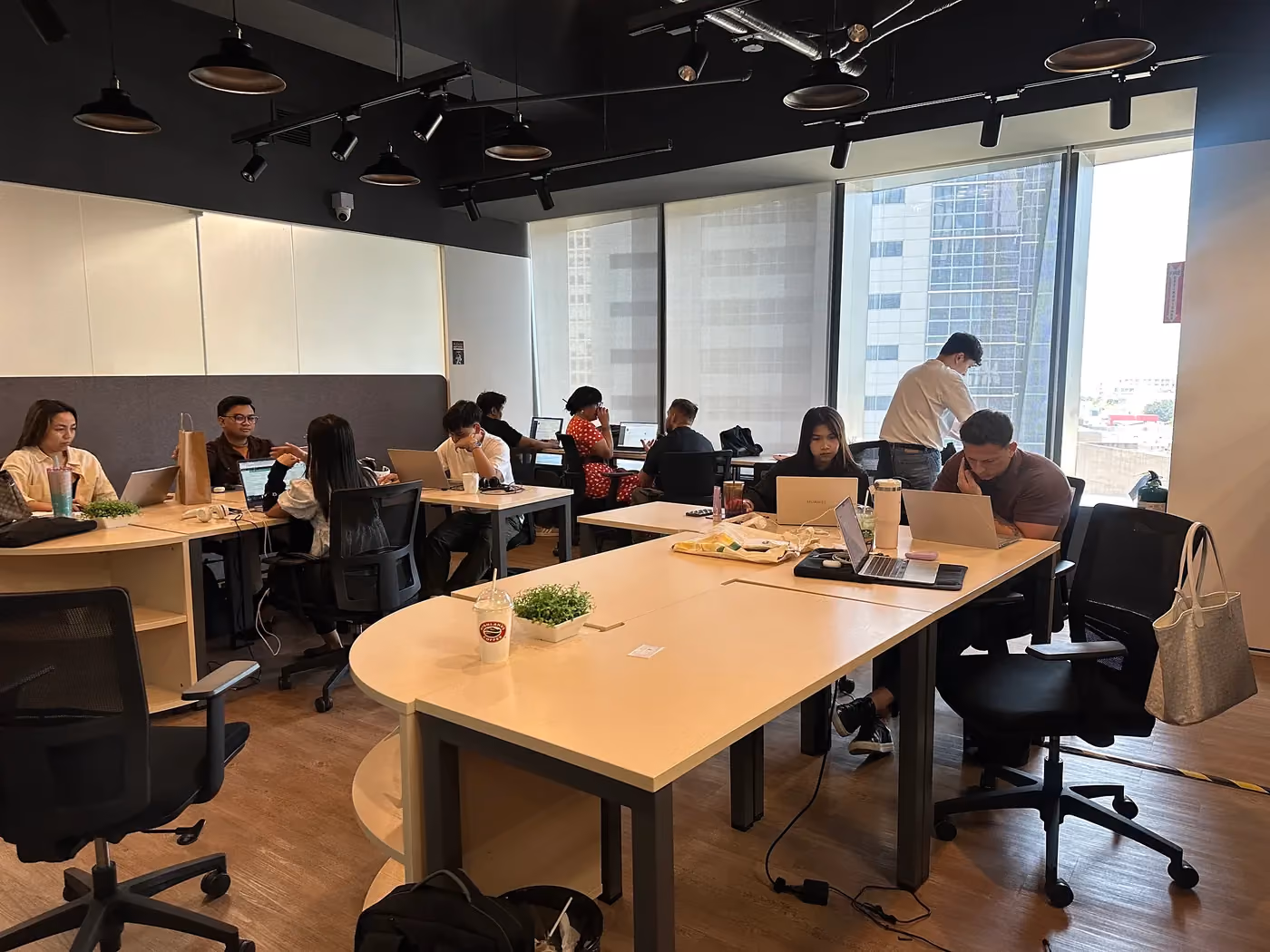 The MGP delivery floor in Taguig, Metro Manila — offshore recruiters at work