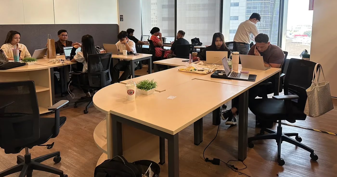 The MGP delivery floor in Taguig, Metro Manila — offshore recruiters at work