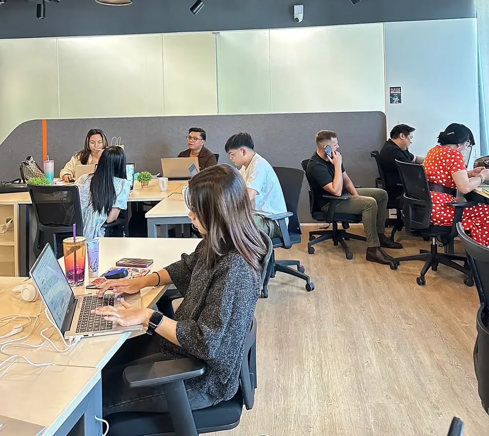 MGP offshore recruiters working at their desks in Manila