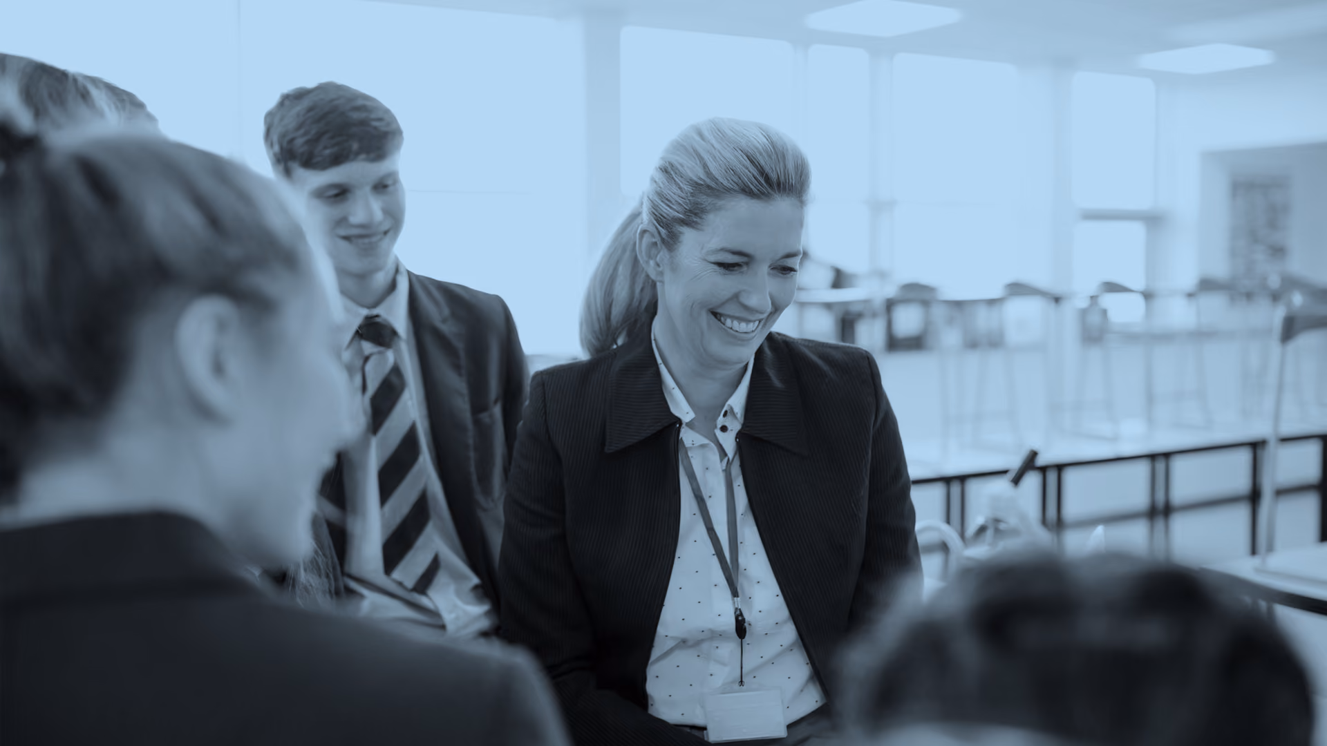 Senior leader with students