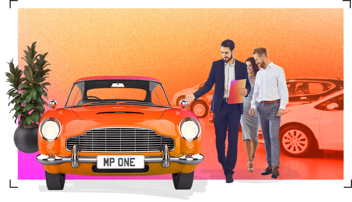 Car salesman selling a car to a couple