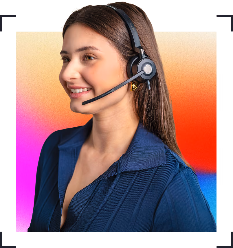 Smiling woman wearing headset and navy shirt against a colourful gradient background.
