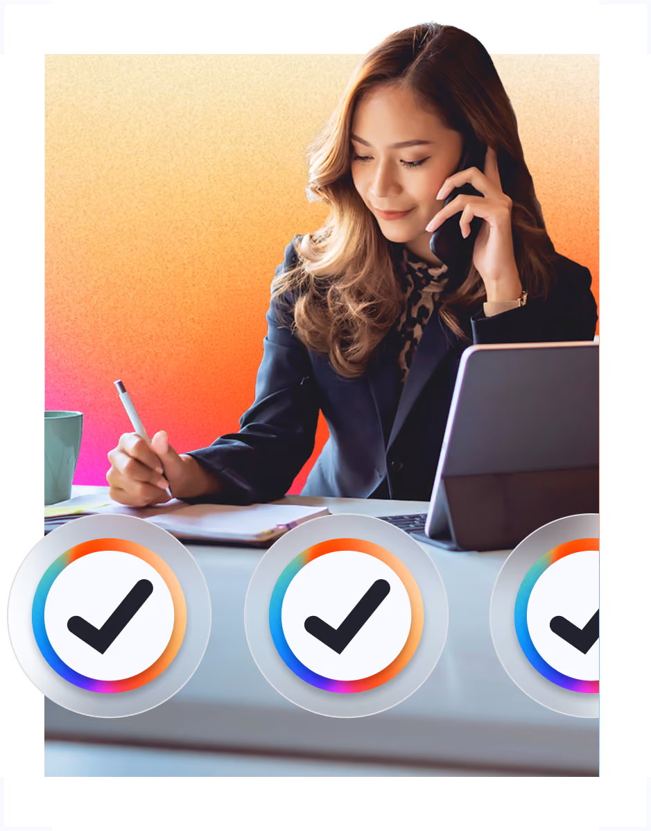 Woman on phone writing notes at desk with laptop and mug, with checkmark icons along bottom.