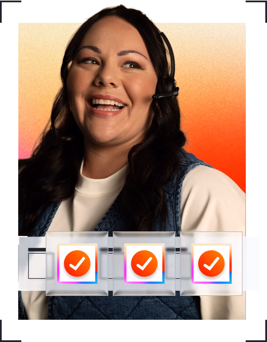 Smiling woman wearing a headset with dark hair and denim vest over white top on a gradient background.