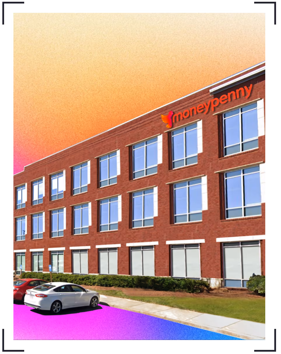Moneypenny USA HQ office building with multiple windows and a Moneypenny sign on the upper right side.