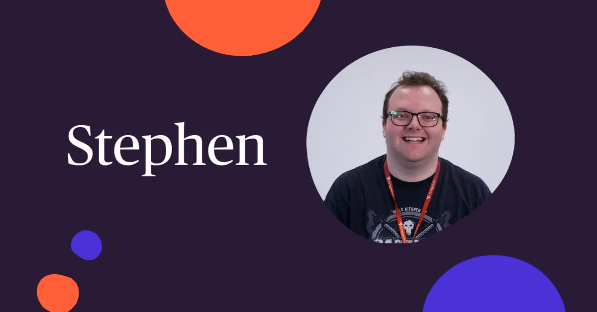 Smiling man with glasses and short curly hair wearing a black t-shirt and red lanyard, inside a circular frame on a dark background with colored circles and the name Stephen in white text.