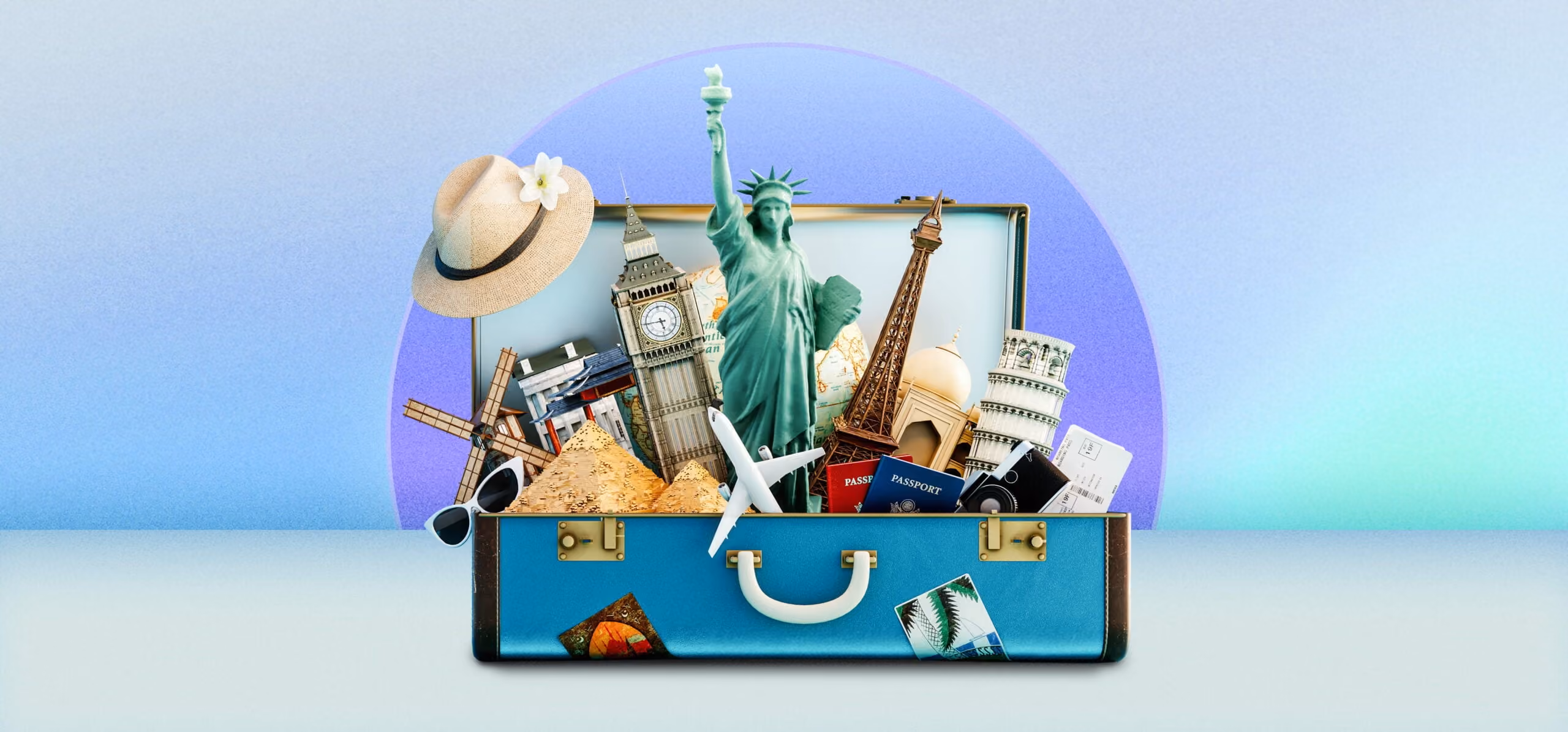 Open blue suitcase with travel icons including Statue of Liberty, Eiffel Tower, Big Ben, pyramids, and passports.