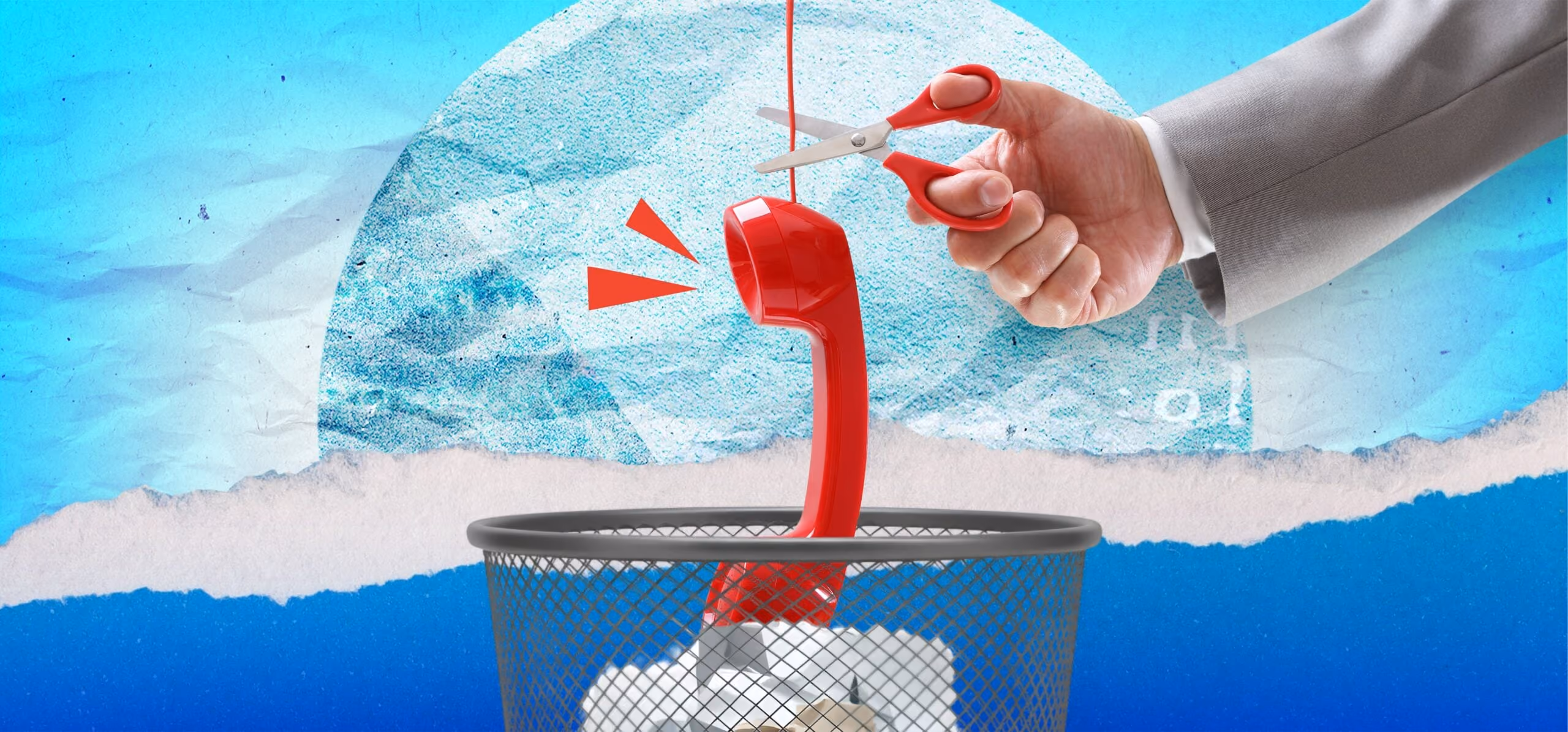 Hand with scissors cutting the cord of a red telephone handset over a trash bin.