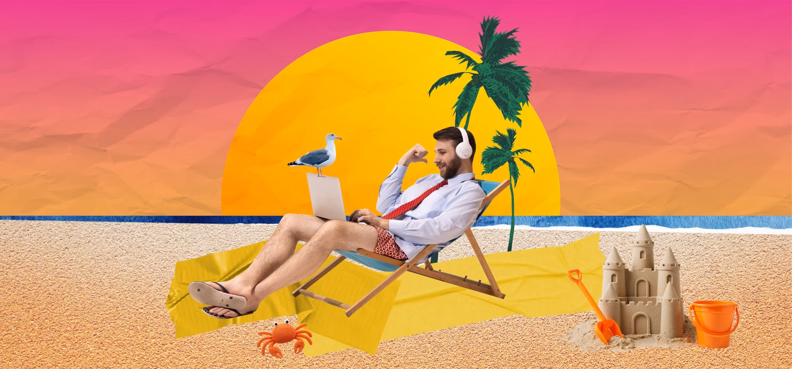 Man in shirt, tie, and shorts works on laptop in beach chair with sunset, palm trees, crab, and sandcastle.